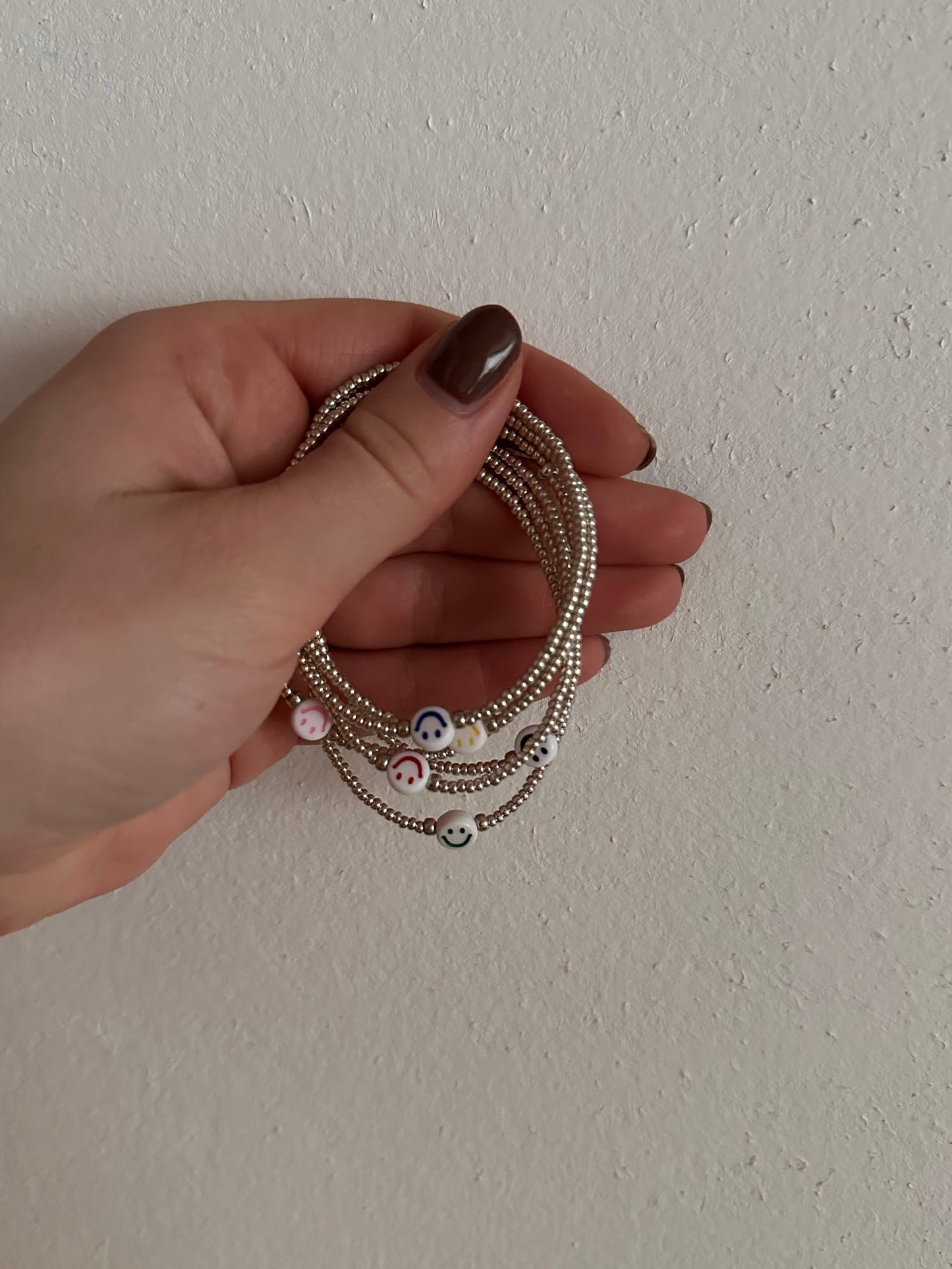 Handmade zilver smiley armbandje
