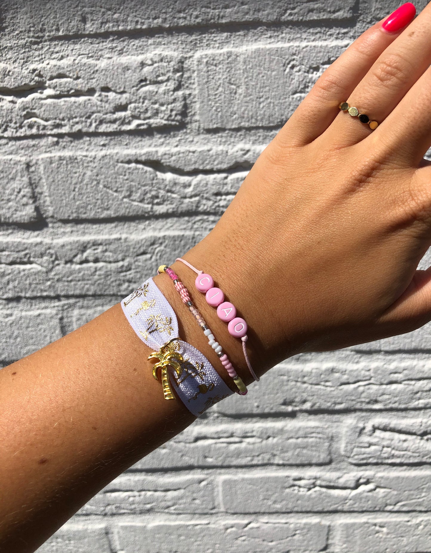 Handmade gepersonaliseerd roze armbandje